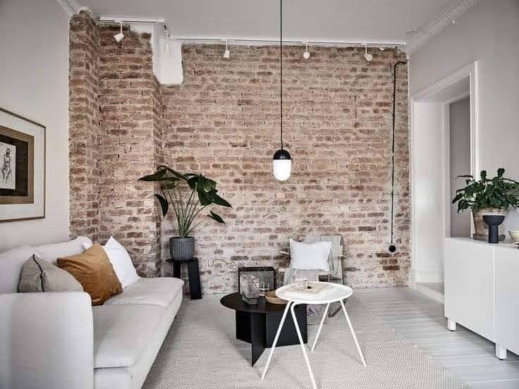 La imagen tiene un atributo ALT vacío; su nombre de archivo es ideas-de-salas-de-estar-con-paredes-de-ladrillo-expuesto-13.jpg